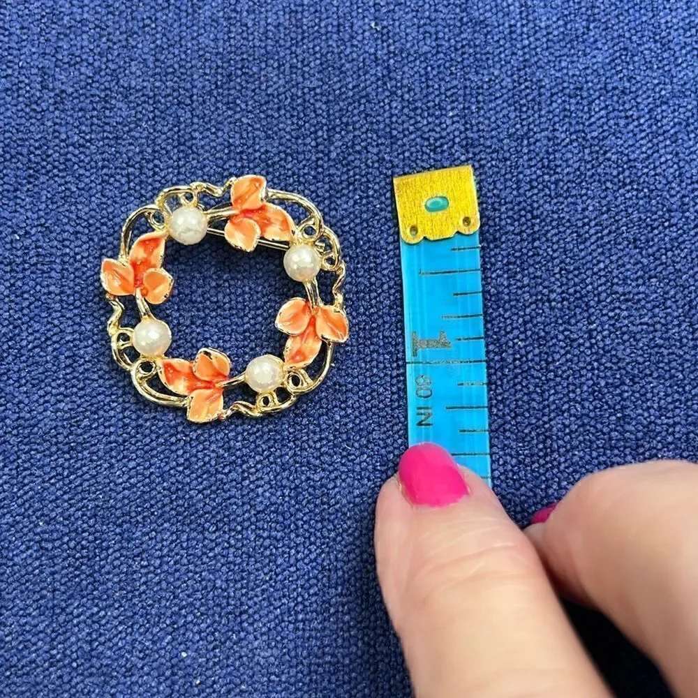 Gerry’s Gold Tone and Orange Wreath